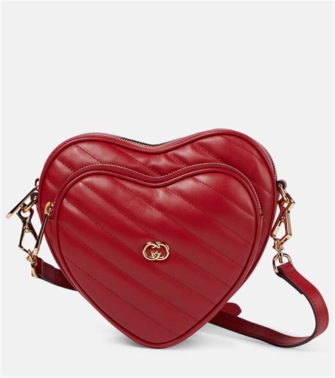 black gucci bag with two red hearts|gucci interlocking g shoulder bag.